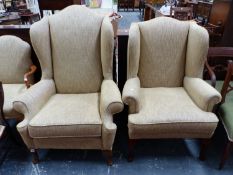 TWO WING ARM CHAIRS UPHOLSTERED IN OATMEAL MATERIAL