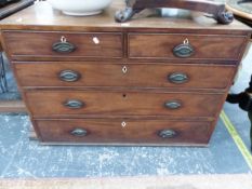 AN OAK CHEST OF TWO SHORT AND THREE LONG DRAWERS