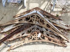 A QUANTITY OF CAST IRON ROOFING BRACKETS