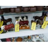 A COLLECTION OF FOUR BESWICK COWS AND THREE HORSES