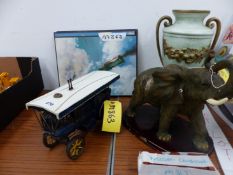 A MODEL TRACTION ENGINE AND THREE AIRCRAFT PRINTS, AN ELEPHANT FIGURE, LAMP BASE AND A WOODEN