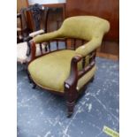 A MAHOGANY ARMCHAIR, THE UPHOLSTERED TOP RAIL AND ARMS SUPPORTED ON A SHOW FRAME BALUSTRADE, THE