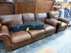 A LEATHER THREE SEAT SETTEE EN SUITE WITH AN ARMCHAIR