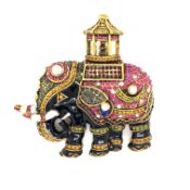 A LARGE ENAMEL AND DIAMANTE EASTERN ELEPHANT COSTUME BROOCH. 8 x 8cms.