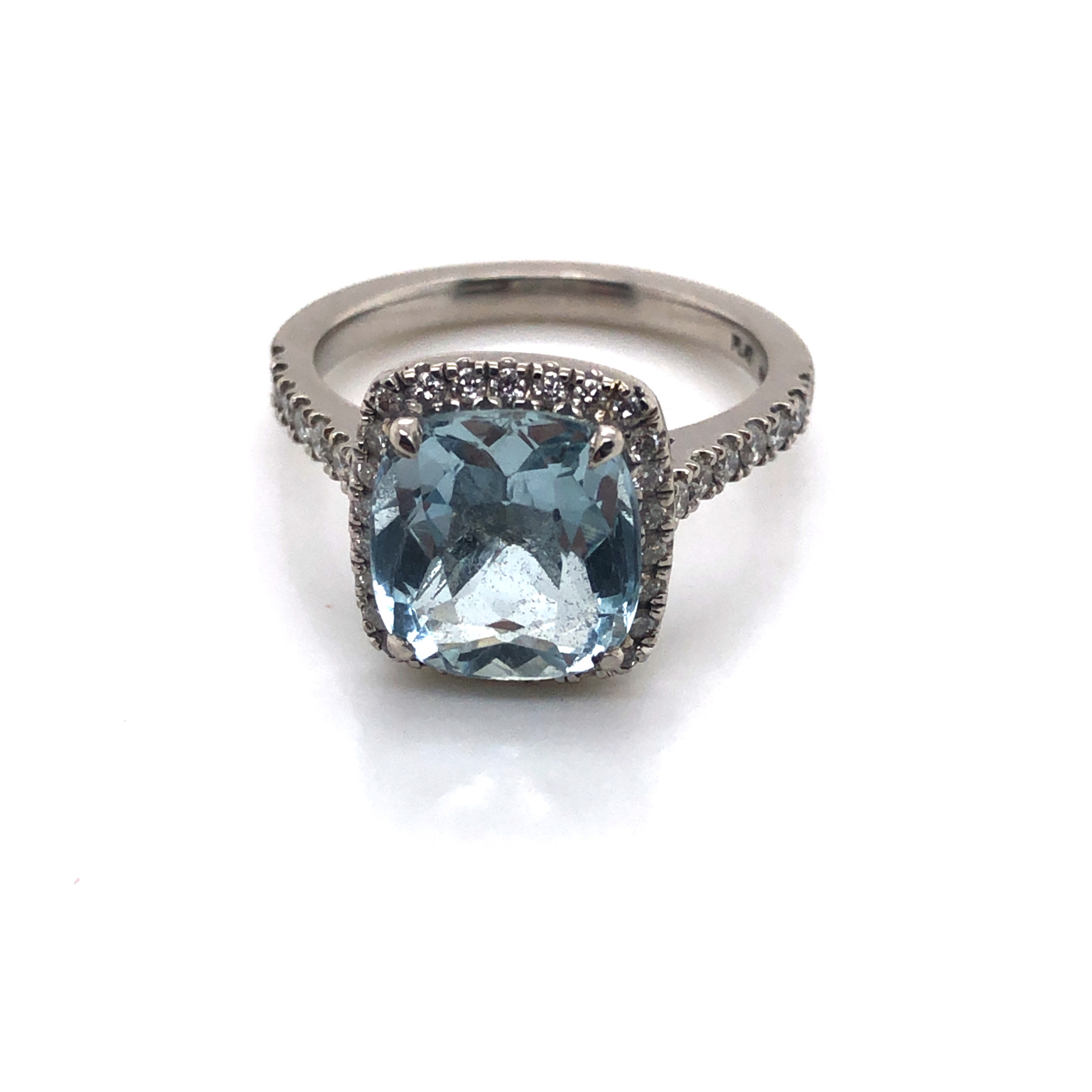 A CUSHION CUT AQUAMARINE AND DIAMOND HALO RING. THE SHANK STAMPED PLAT 950, AND ASSESSED AS - Image 6 of 7