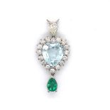 AN EMERALD, DIAMOND AND AQUAMARINE ARTICULATED PENDANT. THE PEAR CUT LEADING DIAMOND SUSPENDING A