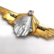 A VINTAGE ART DECO LARGE RHINESTONE AND GOLD PLATED COSTUME BROOCH. LENGTH 13.5cms.