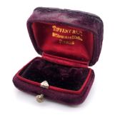 ANTIQUE TIFFANY AND CO HINGED FITTED EARRING CASE IN PURPLE VELVETEEN. MEASURING 4.5 x 3.3 x 2.
