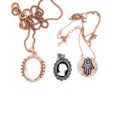 TWO SILVER AND ROSE GOLD GILT PORTRAIT CAMEO PENDANTS ONE SUSPENDED ON A 44cms FANCY LINK CHAIN,