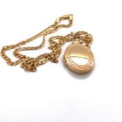 A 9ct GOLD HALLMARKED OVAL PORTRAIT LOCKET AND 9ct GOLD HALLMARKED CURB CHAIN. CHAIN LENGTH 46cms,