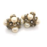 A PAIR OF VINTAGE FRENCH COUTURE GOLD TONE, PEARL AND CRYSTAL EAR CLIPS SIGNED WOLOCH PARIS.
