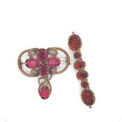 AN ANTIQUE RED PASTE AND BRASS BROOCH, TOGETHER WITH A SIX STONE ORANGE PASTE ANTIQUE BAR BROOCH.