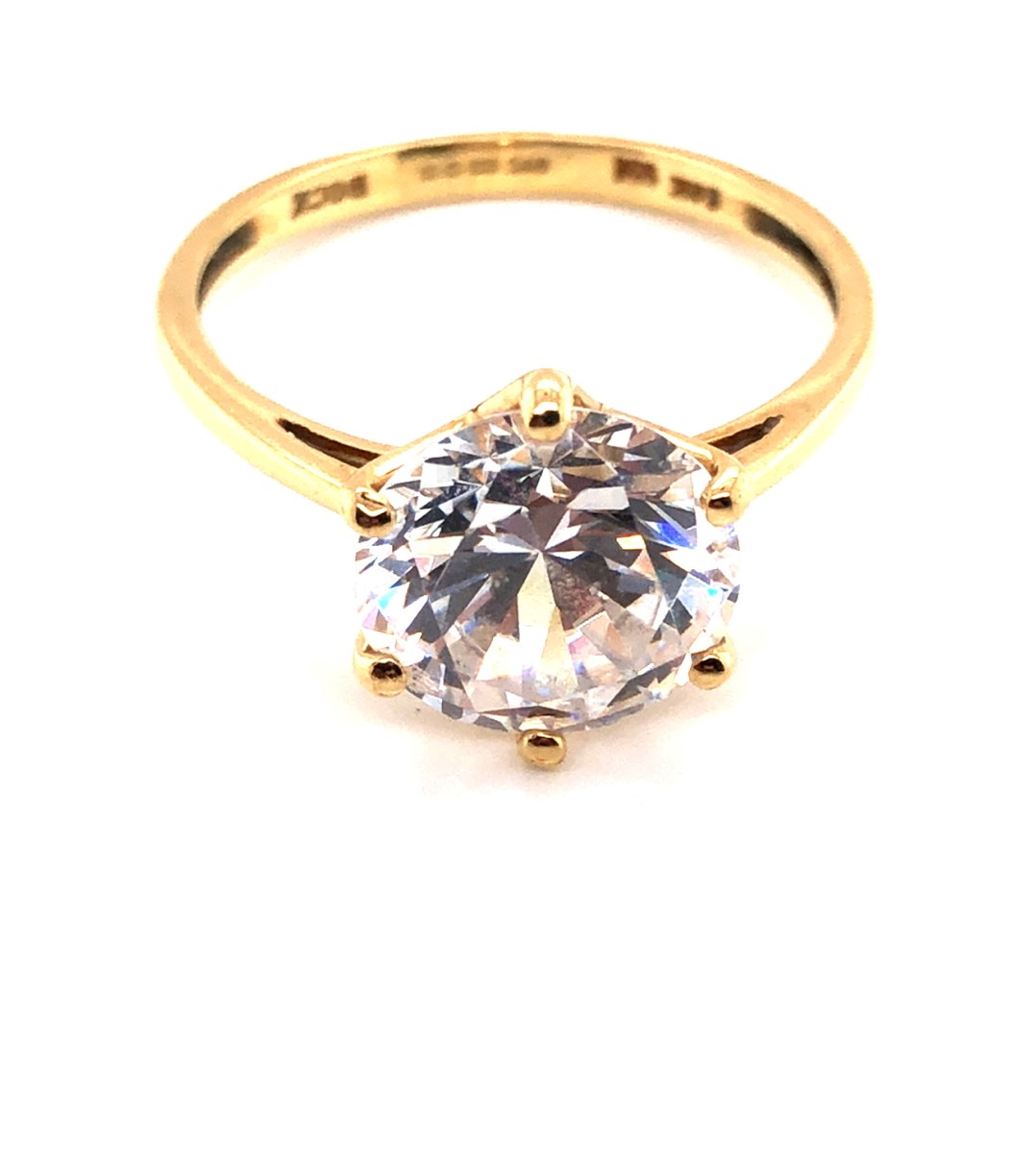 A 14ct HALLMARKED YELLOW GOLD LARGE CUBIC ZIRCONIA MODERN COCKTAIL RING. THE SOLITAIRE IN A RAISED