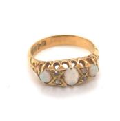 AN EDWARDIAN 18ct YELLOW GOLD HALLMARKED DIAMOND AND NATURAL OPAL TRIPLET. OPAL SIZES LARGEST 5 X