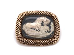 AN ANTIQUE CRYSTAL SULPHIDE INTAGLIO BROOCH DEPICTING A HORSE AND LION SCENE AFTER GEORGE STUBBS. T