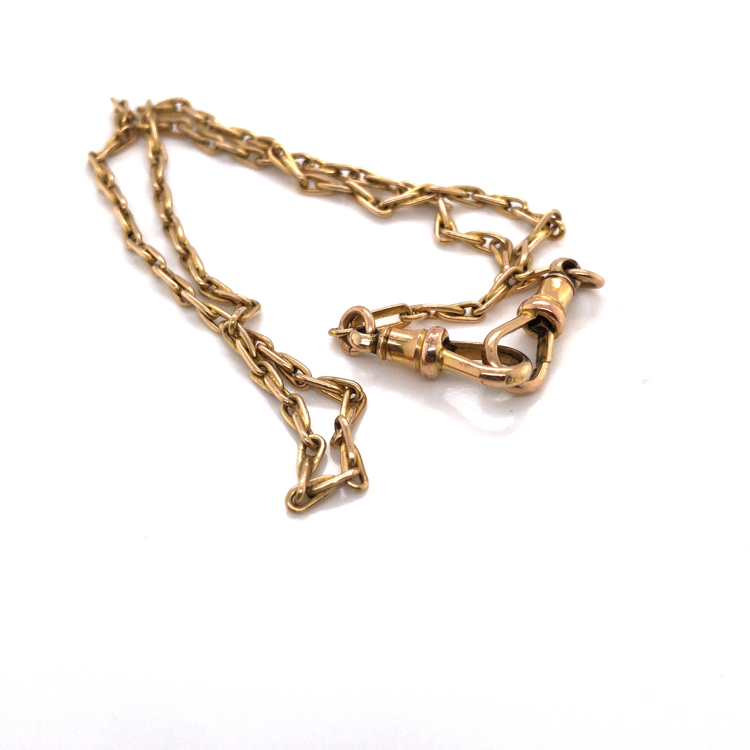 A VINTAGE HAYSEED LINK ALBERT CHAIN COMPLETE WITH TWO DOG TOOTH CLASPS. LENGTH 36cms. ONE LINKED