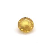 A ROUND MIXED CUT BRIGHT YELLOW SAPPHIRE. APPROX MEASUREMENTS 6.68mm x 4.00mm. APPROX CARAT WEIGHT