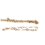 A 9ct YELLOW GOLD HALLMARKED FANCY GATE LINK BRACELET COMPLETE WITH SAFETY CHAIN LENGTH 20cms,