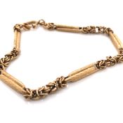 A 9ct YELLOW GOLD HALLMARKED BAR AND BYZANTINE LINK BRACELET. LENGTH 21cms. WEIGHT 7.76grms.