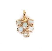 A NATURAL OPAL PENDANT. SIX OVAL OPALS EACH IN FOUR CLAW SETTINGS WITH INTERTWINED VINE