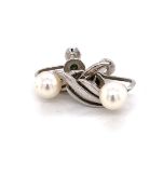 A PAIR OF VINTAGE MIKIMOTO CULTURED AKOYA PEARL AND SILVER SCREW BACK EARRINGS COMPLETE WITH