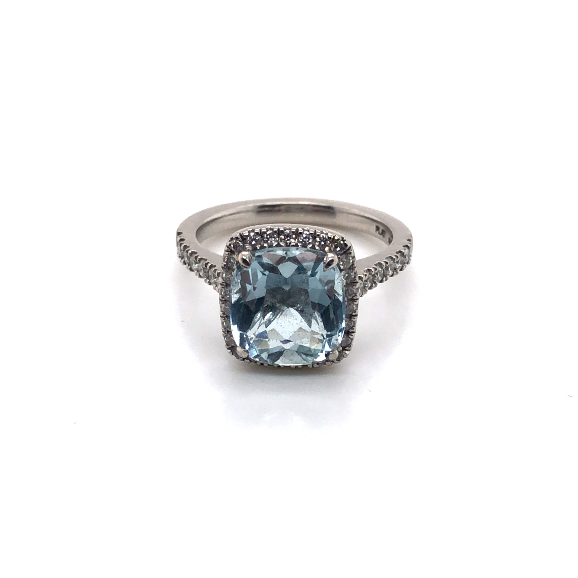A CUSHION CUT AQUAMARINE AND DIAMOND HALO RING. THE SHANK STAMPED PLAT 950, AND ASSESSED AS - Image 7 of 7