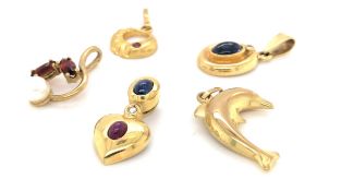 FOUR VARIOUS UNHALLMAKRED AND STAMPED 333, 8ct GERMAN GOLD GEMSET PENDANTS SET WITH CABOCHON