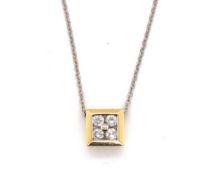 A FOUR STONE DIAMOND PENDANT IN A BEZEL SETTING UNHALLMARKED STAMPED 750 AND ASSESSED AS 18ct YELLOW