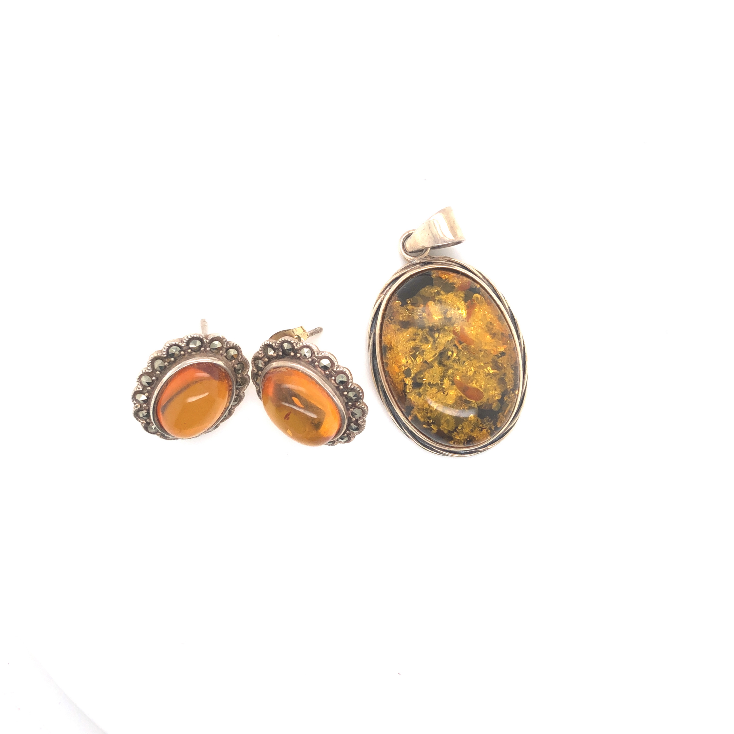 A PAIR OF AMBER AND MARCASITE STUD EARRINGS, TOGETHER WITH A OVAL AMBER RUB OVER SET PENDANT. THE - Image 2 of 2