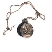 AN UNUSUAL ARTICULATING LOCKET DEPICTING A FAIRY RIDING A BIRD SUSPENDED ONA SILVER BELCHER CHAIN.