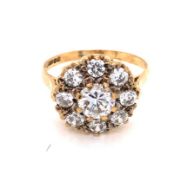 A 9ct HALLMARKED YELLOW GOLD CUBIC ZIRCONIA CLUSTER RING. DATED 1982, BIRMINGHAM. FINGER SIZE O 1/2.