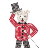 A LARGE VINTAGE SIGNED BUTLER AND WILSON RHINESTONE TAP DANCING BEAR BROOCH WITH TOP HAT AND CANE.