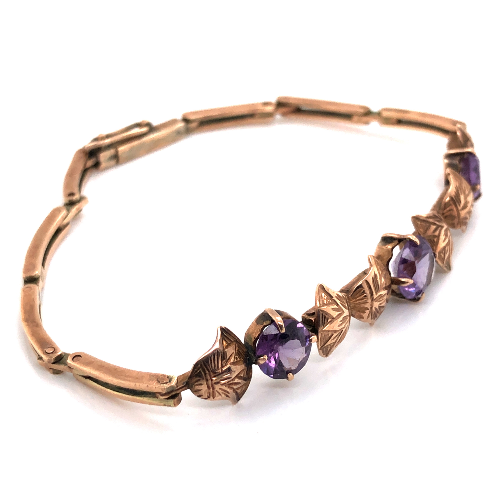 A VINTAGE THREE STONE SYNTHETIC COLOUR CHANGE SAPPHIRE BRACELET. THE THREE PURPLE/BLUE STONES - Image 2 of 6