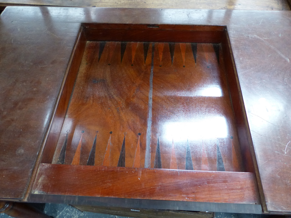 A REGENCY MAHOGANY FLAP TOP GAMES TABLE, THE CENTRAL CHESS BOARD SLIDING OUT TO REVEAL A RECESSED BA - Image 2 of 7