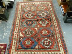 AN ANTIQUE CAUCASIAN KAZAK RUG. 210 x 139cm