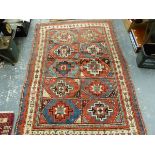 AN ANTIQUE CAUCASIAN KAZAK RUG. 210 x 139cm