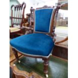 A VICTORIAN MAHOGANY NURSING CHAIR UPHOLSTERED IN BLUE VELVET TOGETHER WITH AN EDWARDIAN MAHOGANY EL