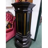 A PAIR OF VINTAGE BLACK PAINTED CANTED SQUARE SECTIONED ACHITECTURAL COLUMNAR PLINTHS WI