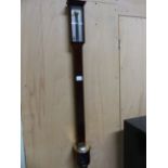 WILLIAM DUNCAN, ABERDEEN, A BRASS MOUNTED MAHOGANY STICK BAROMETER WITH SILVERED DIAL. H 92cms.