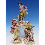 THREE GERMAN PORCELAIN FIGURES, A MALE AND A FEMALE MUSICIAN TOGETHER WITH A SHEPHERD, TWO WITH GOLD