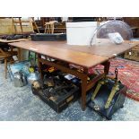 A RETRO TEAK RECTANGULAR FLAP TOP TABLE EXTENDING ON TAPERING CYLINDRICAL LEGS. W 140 x D 106 x H