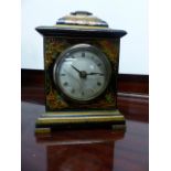 A CHINOISERIE DECORATED SMALL BRACKET CLOCK.