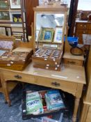 AN ANTIQUE ASH MIRROR BACKED DRESSING TABLE WITH TWO DRAWERS RECESSED ABOVE THE TWO APRON DRAWERS