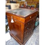 A REGENCY BURR MAPLE DAVENPORT DESK WITH GREEN LEATHER INSET SLOPING LID AND THREE DRAWERS TO ONE SI