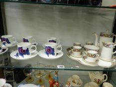 WEDGWOOD SUSIE COOPER POPPY PATTERN COFFEE CANS AND SAUCERS, AND A VINTAGE AYNSLEY COFFEE SET ON