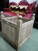 A PAIR OF TEAK ORANGE TREE TUBS WITH BALL FINIALS AT THE CORNERS OF THE SQUARE SIDES. W 45 x D 45