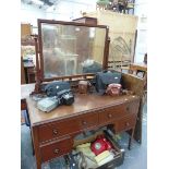 A MAHOGANY MIRROR BACKED DRESSING TABLE, THE FOUR DRAWERS WITH WHITE CENTRED EBONY KNOB HANDLES
