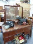 A MAHOGANY MIRROR BACKED DRESSING TABLE, THE FOUR DRAWERS WITH WHITE CENTRED EBONY KNOB HANDLES