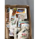A SMALL BOX OF LOOSE CIGARETTE CARDS