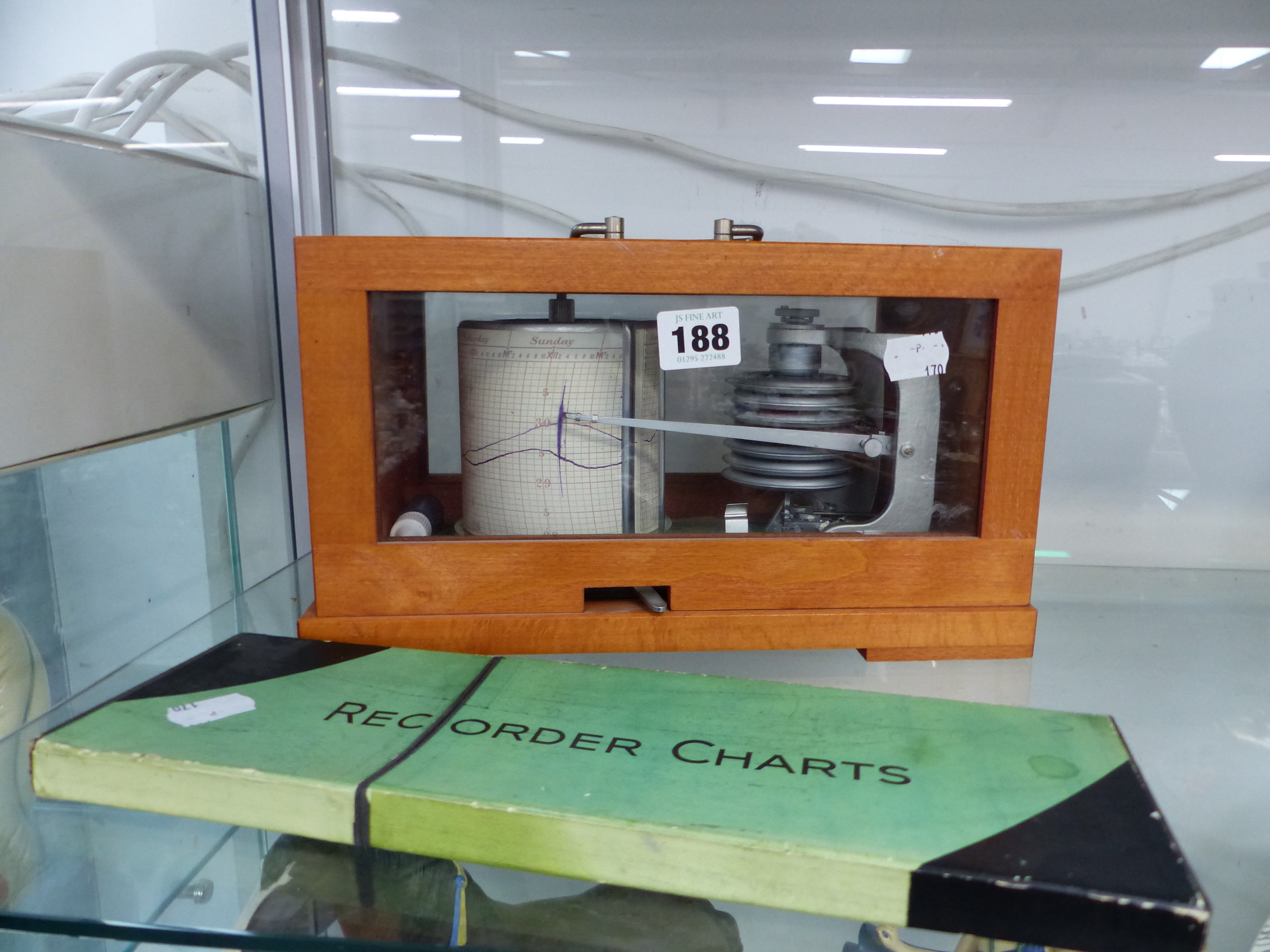 A BAROGRAPH AND RECORDER CHARTS